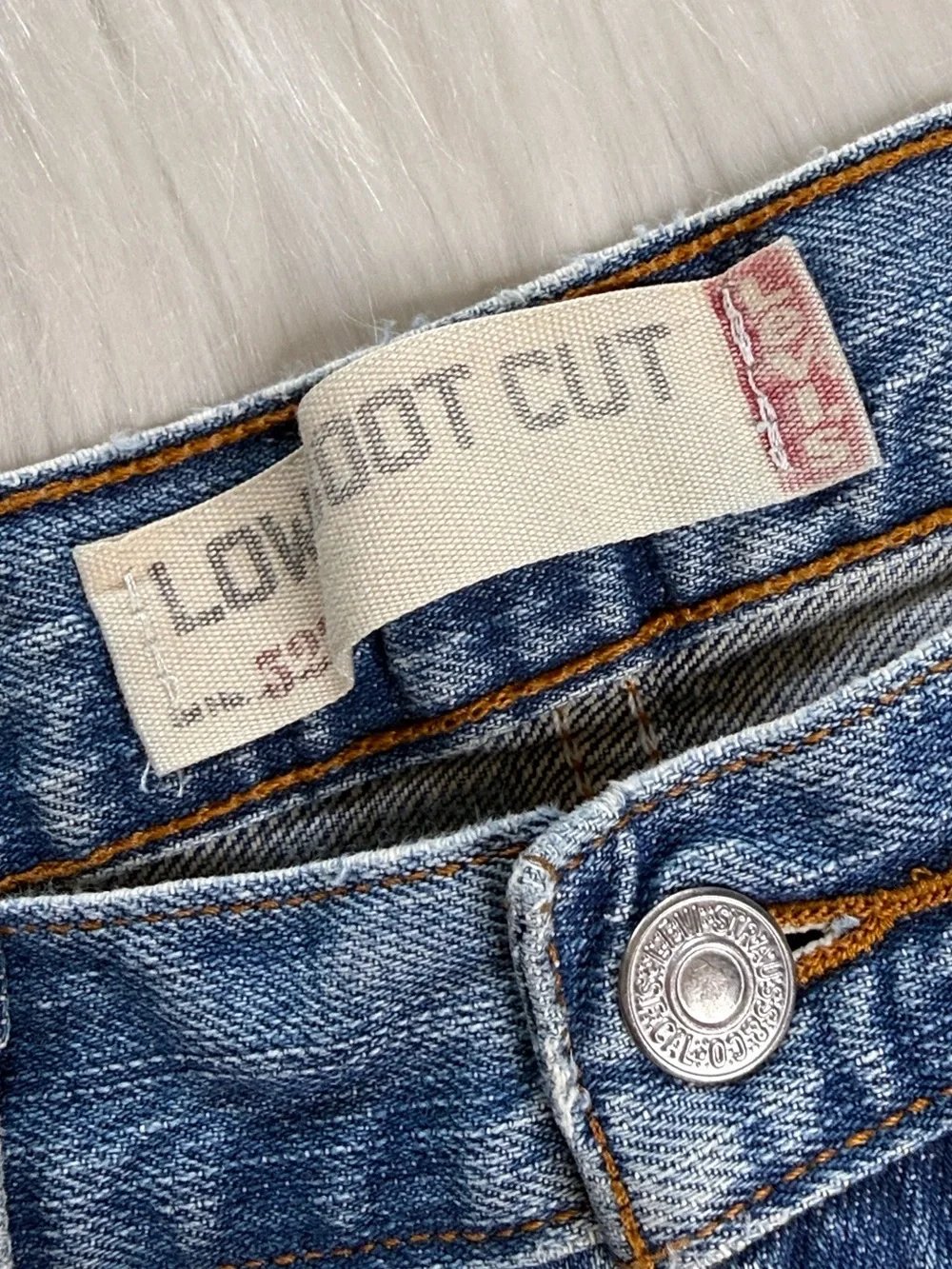 Levi’s Faded Whiskered High Rise Denim Cut Offs from Mens Bootcut Jeans